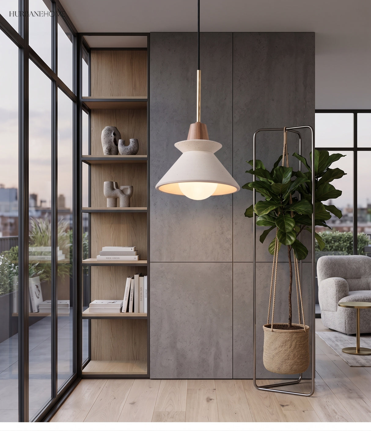 Cone pendant hanging in an open plan room beside tall glass partitions