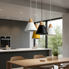 Three cone pendants in white, yellow and black hanging together