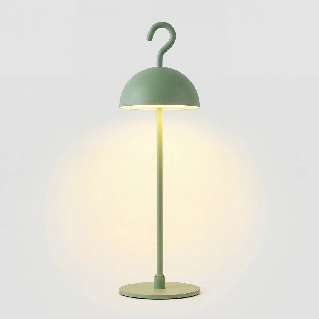 Green cordless LED table lamp with metal dome shade and hook top on round base