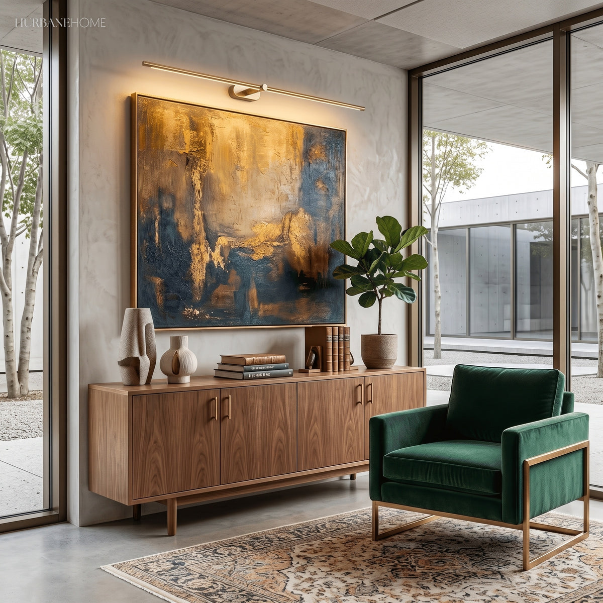 Linear wall light lit above a large gold artwork on a dark tiled wall