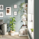 Corner book shelf styled with decorative accents