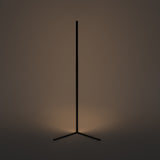 Close-up of the triangle corner base and lower body of the floor lamp