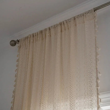 Cotton boho curtains softly filtering daylight in bedroom window