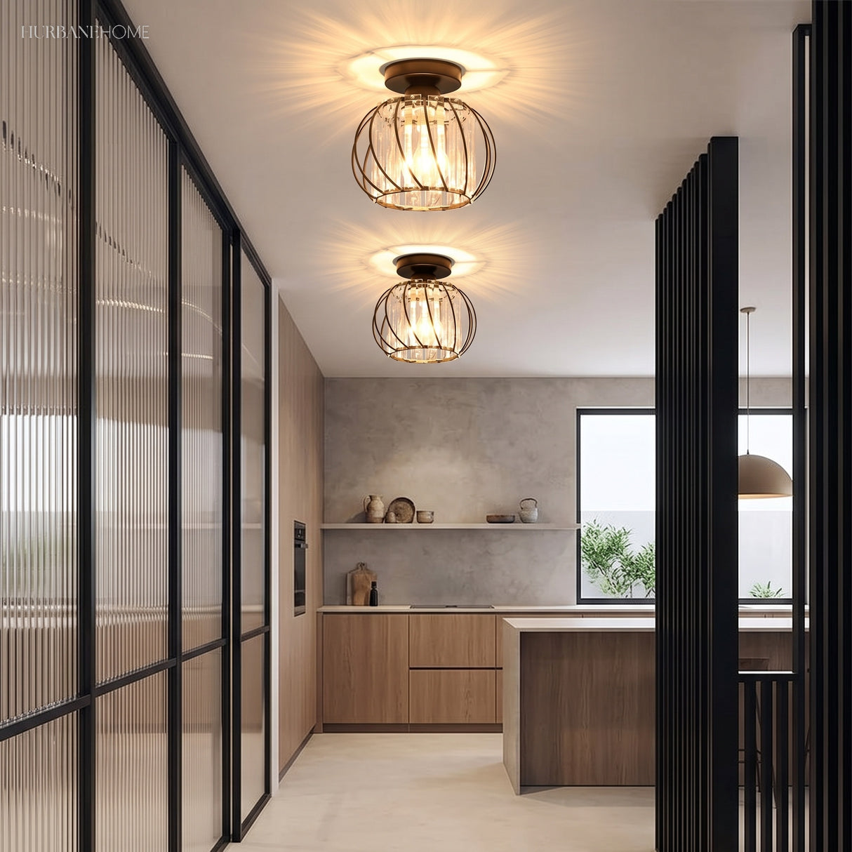 Two crystal cage ceiling lights along a hallway beside a timber kitchen