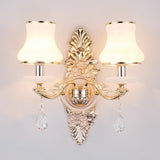 Silver two light sconce with opal glass shades and crystal drops
