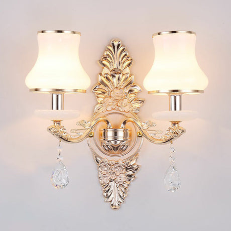 Silver two light sconce with opal glass shades and crystal drops