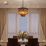 50 cm crystal chandelier presented against a pale studio wall
