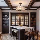 Black crystal drum semi flush light in a butler pantry bar