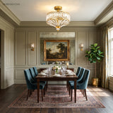 Gold crystal drum semi flush light in a traditional dining room