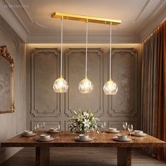Crystal pendant casting refracted light across a dark panelled wall