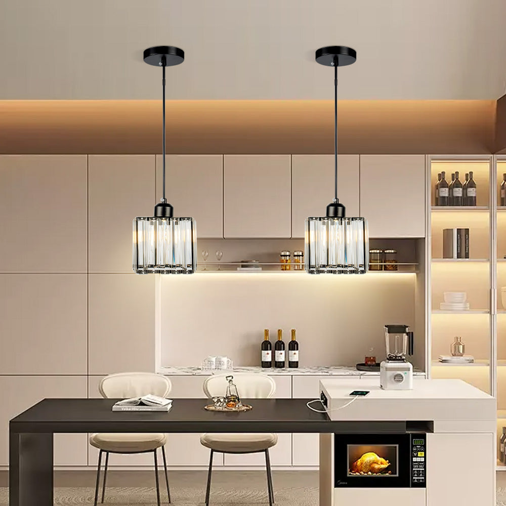 Two mini crystal pendants above a pale kitchen counter and bar stools
