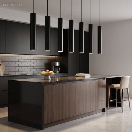 Row of black tube pendants above a dark kitchen island and stools
