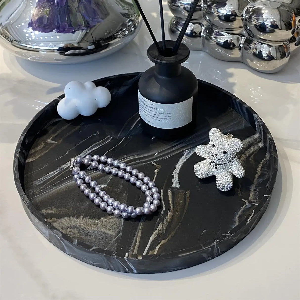 Decorative tray for bathroom counter styled on modern vanity