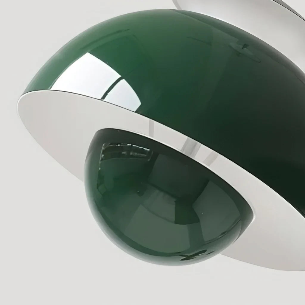 Detail of the domed cap and orb base of the metal bud pendant light