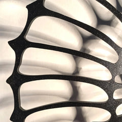 Detail of the shell wall light mount and finish