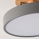 Angled detail showing the frosted diffuser panel of the wood ceiling light