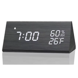 Digital table clock with LED display and sound activation