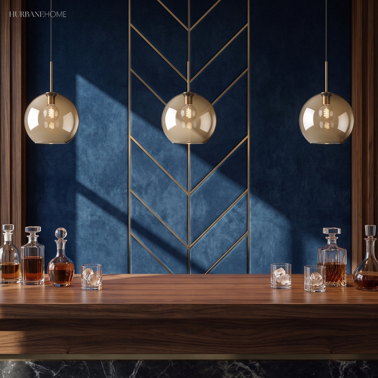 Three amber globe pendants over a table against a blue chevron wall