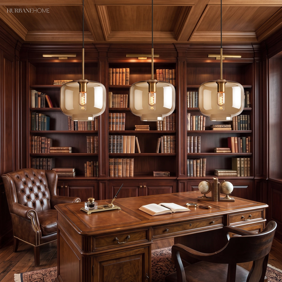 Three amber glass pendants above a desk in a wood paneled library
