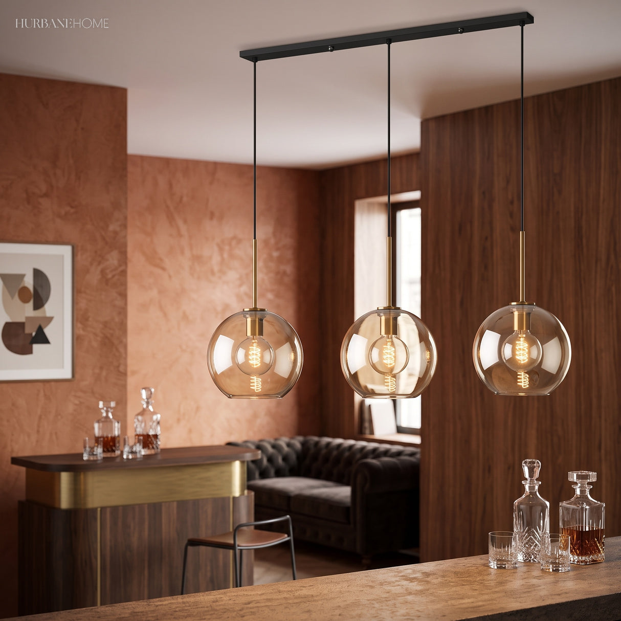 Three amber pendants hanging above a bar with terracotta walls
