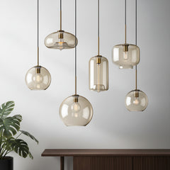 Six amber pendants in globe, urn and jar shapes hanging together