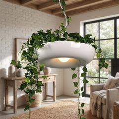 White ring planter pendant with trailing ivy and a downlight