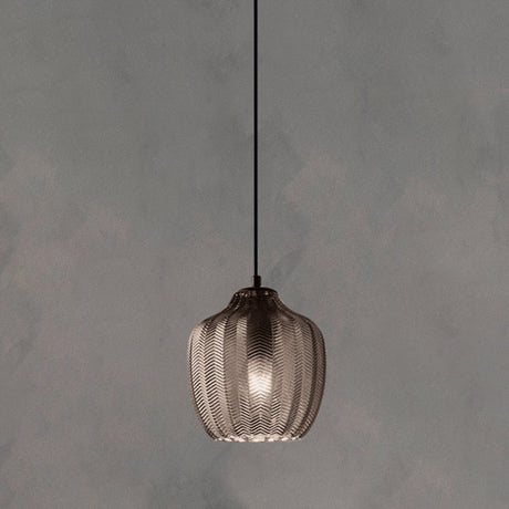 Smoke ribbed pendant with a rounded shade, lit against grey
