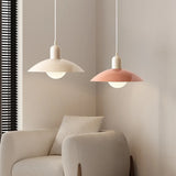 Underside view of dome pendant light showing central opal glass globe