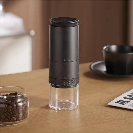 Electric coffee bean grinder featuring external grind size adjustment