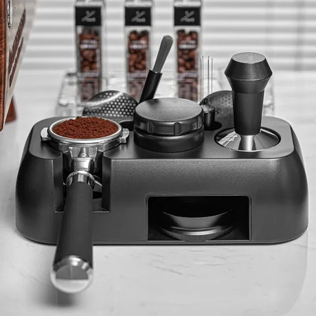 Espresso tamping station with portafilter holder on countertop