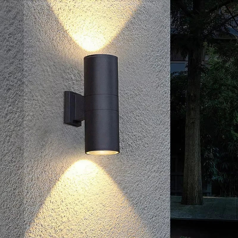 Weatherproof exterior wall light IP65 with sand black finish shown from side view