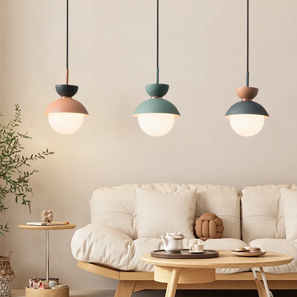 Grey macaron pendant light showing the stacked finial and domed shade