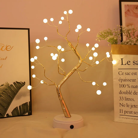 Fairy light fairy tree lit warm glow bedroom setting