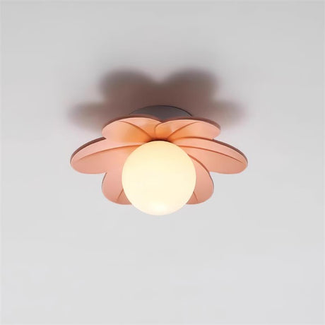 Pink flower ceiling light fitted flat to a white ceiling and casting a soft shadow