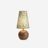 Studio photo of the floral table lamp unlit on a plain white background