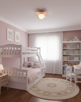 Flower ceiling light in a pink children's bedroom with a bunk bed and bookcase