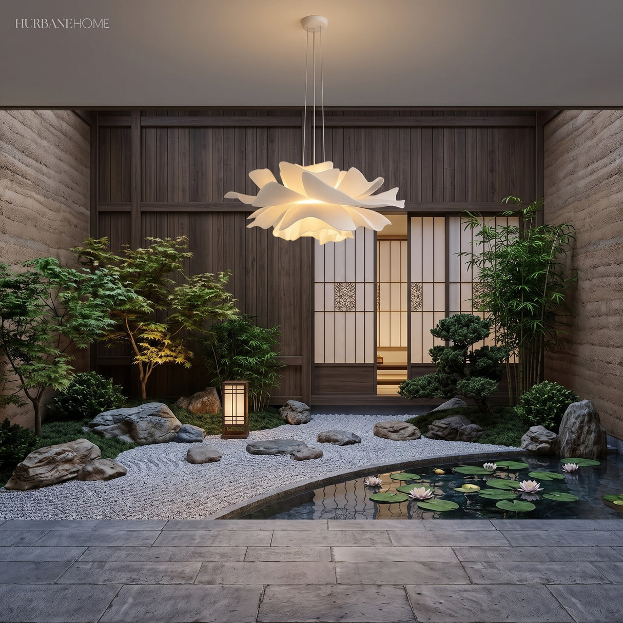 White lotus petal pendant light above a bench by a courtyard garden