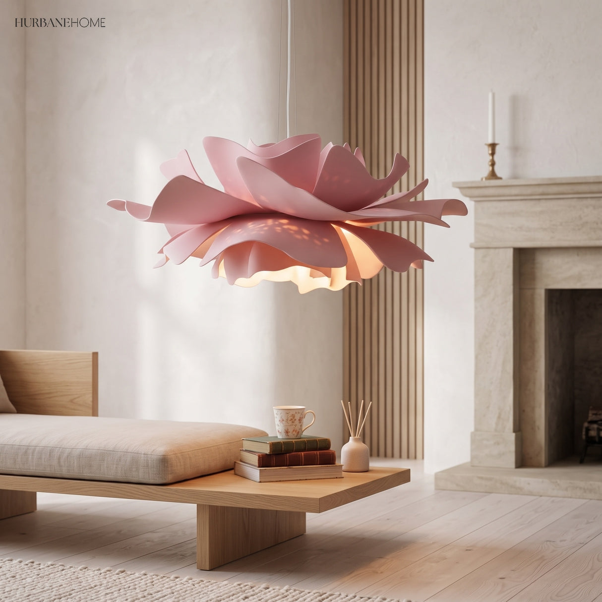 Pink flower pendant light in a room with a fireplace