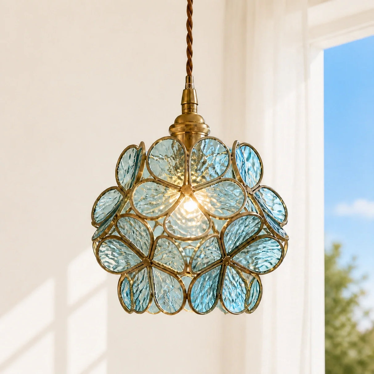 Underside view of the flower petal glass pendant light showing the central bulb