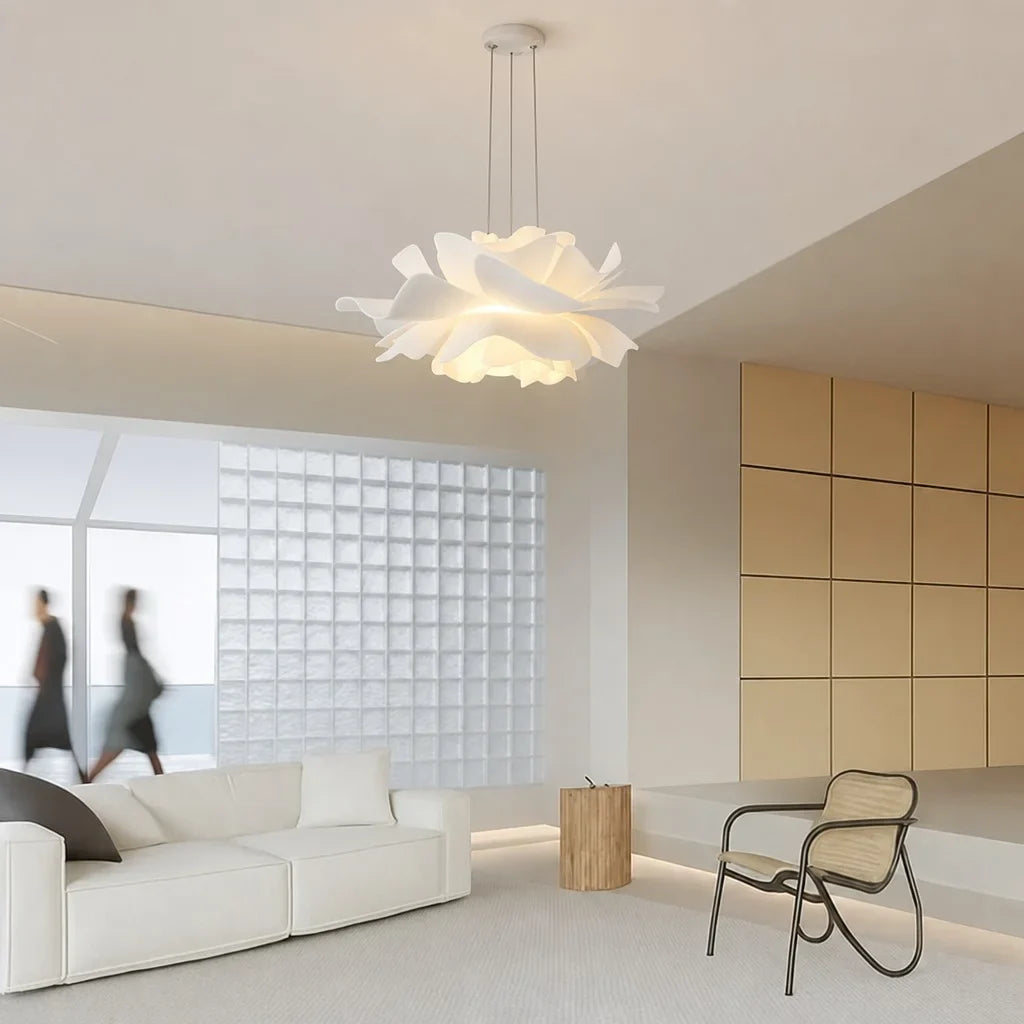 White flower shaped pendant light in a minimalist lounge