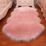 Fluffy imitation wool rug adding warmth to neutral bedroom interior