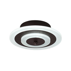 Underside of the round ceiling light showing the coffee center disc