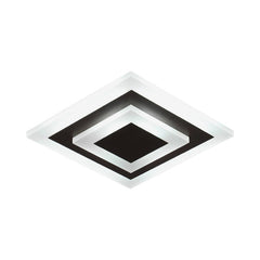 Square white plate with a coffee center seen from a low angle