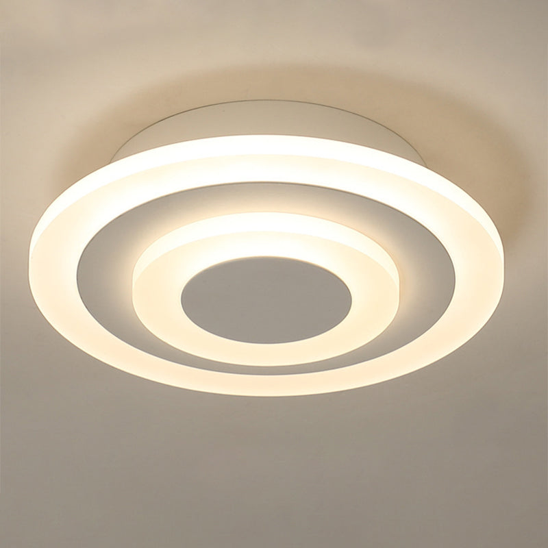 Close up of the lit round acrylic plate glowing warm white