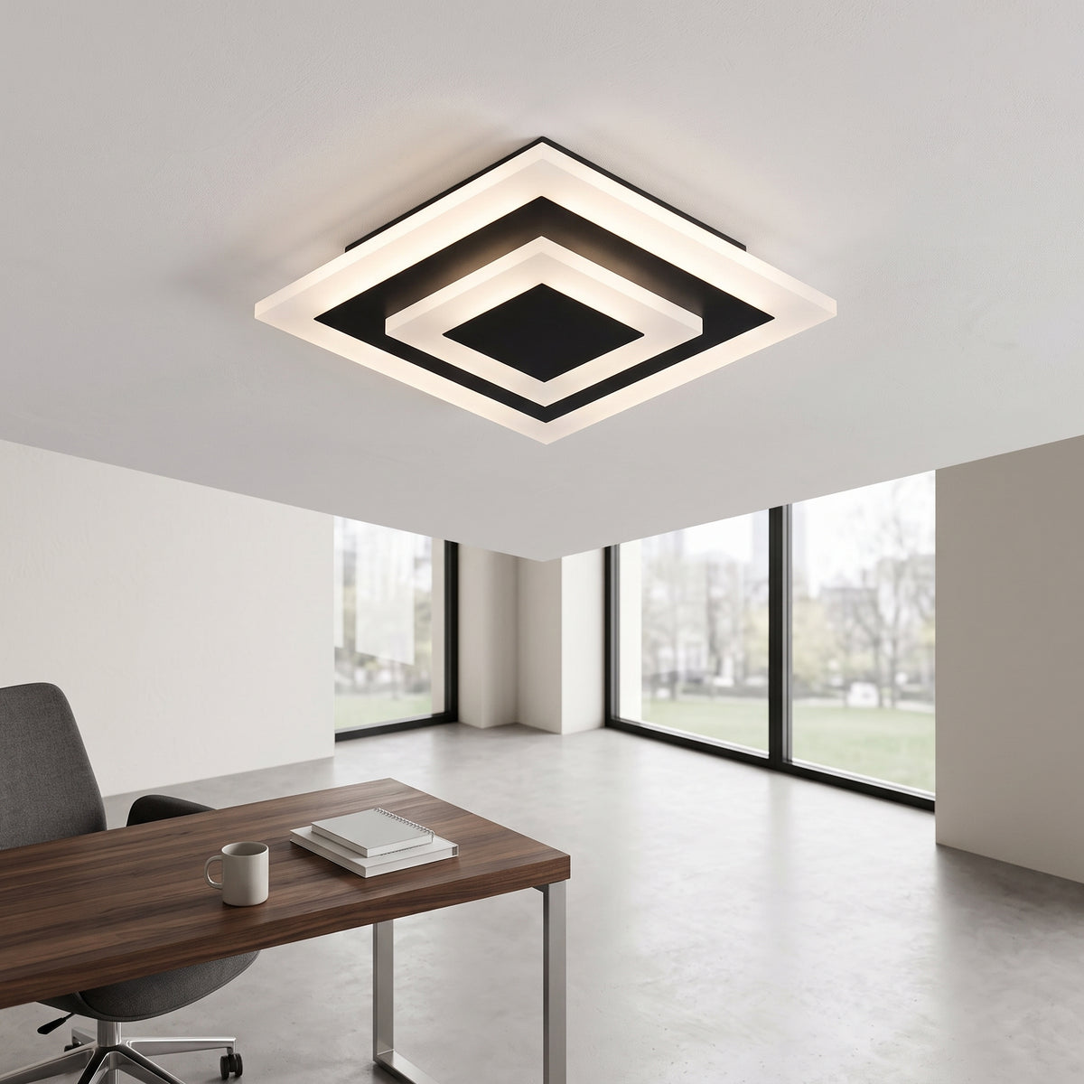 Square white ceiling light with a coffee center above a home office desk