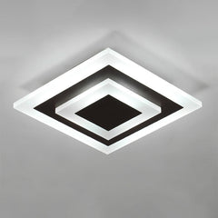 Angled studio view of the square white plate with a coffee center