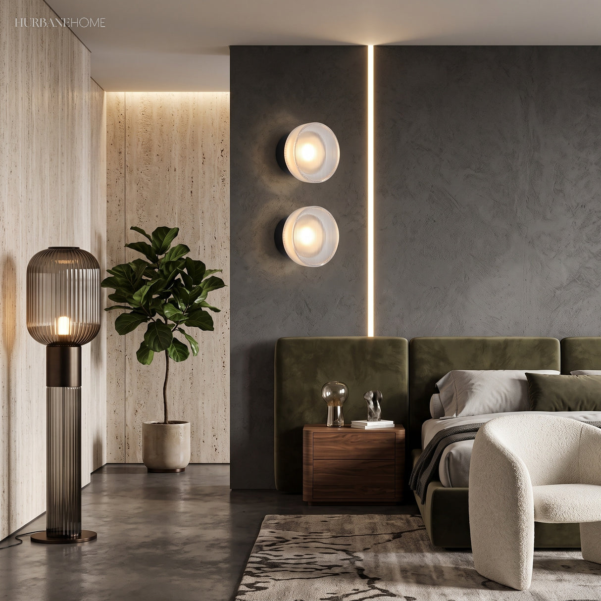Two ribbed disc wall lights on a dark bedroom wall beside a bed