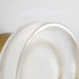 Gold ribbed wall light marked 13cm across and 9cm deep