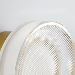 Gold ribbed wall light marked 13cm across and 9cm deep