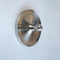 Plain brushed silver disc light with a chrome tipped bulb